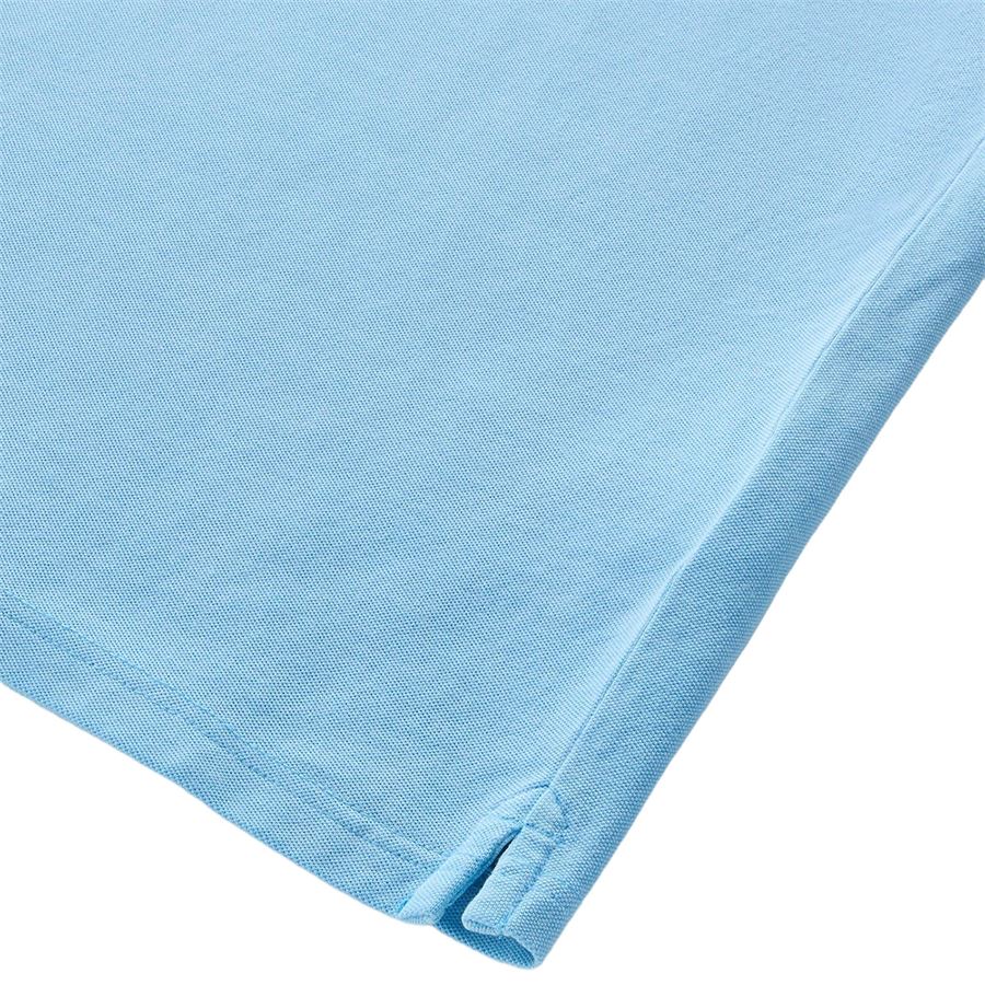 Polo Mackinack tinta in capo in piqué di cotone elasticizzato da uomo Woolrich | CFWOPO006530050